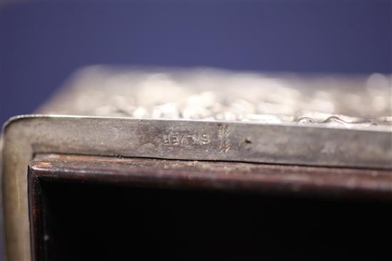 An early 20th century Japanese silver mounted hardwood cigarette box, 5.5in.